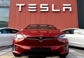 Tesla achieves landmark with first $1B quarterly profit.