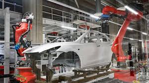 Tesla German gigafactory begins operations, unveils its first automobiles.