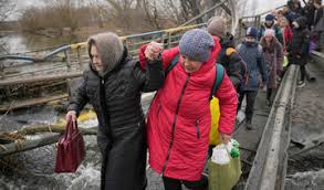 Ukrainians flee besieged cities along agreed evacuation corridors.