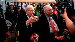 Warren Buffett unveils $51b investments and rails against Wall Street extravagance at the Berkshire meeting.