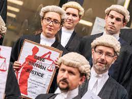 UK Criminal justice system grinds to a halt as Trial Barristers embark on an indefinite strike.