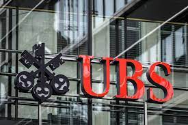 Swiss government invokes emergency provisions as UBS takes over Credit Suisse in a $1b all-share deal.