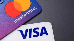 Global payments processors MasterCard and Visa’s merchant fees infringe competition law, UK tribunal rules.